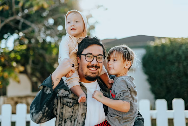 Parent and child representing families affected by genetic disease